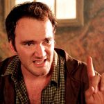 Quentin Tarantino points his finger up in Desperado