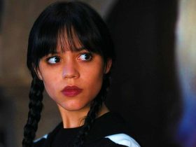 Wednesday Addams (Jenna Ortega) looking somewhat shocked in Wednesday.