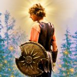 Walker Scobell as Percy Jackson holding a shield with a background featuring trees
